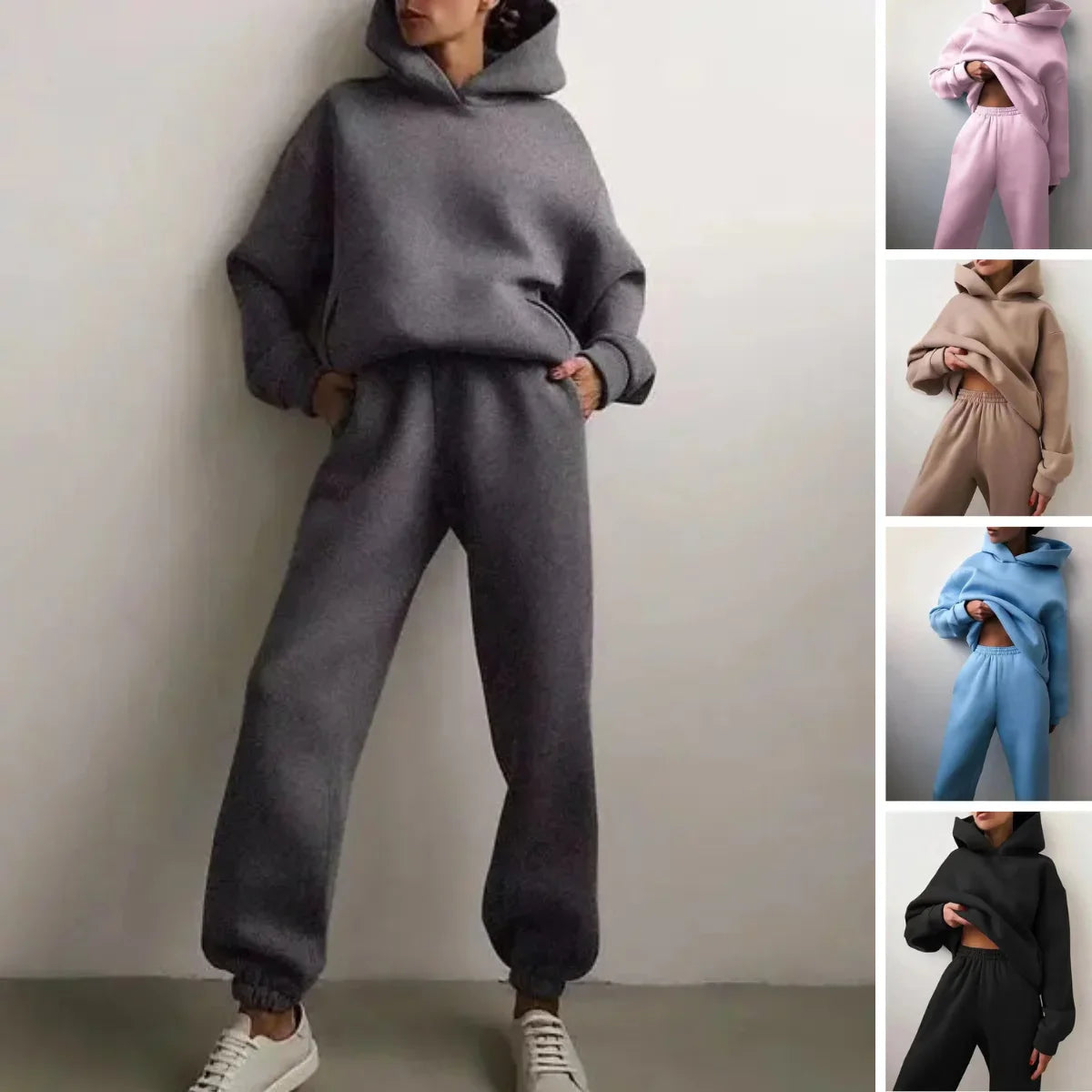 Ensemble deux pièces ample pour femmes en tissu respirant, coupe moderne et décontractée, couleur noire.