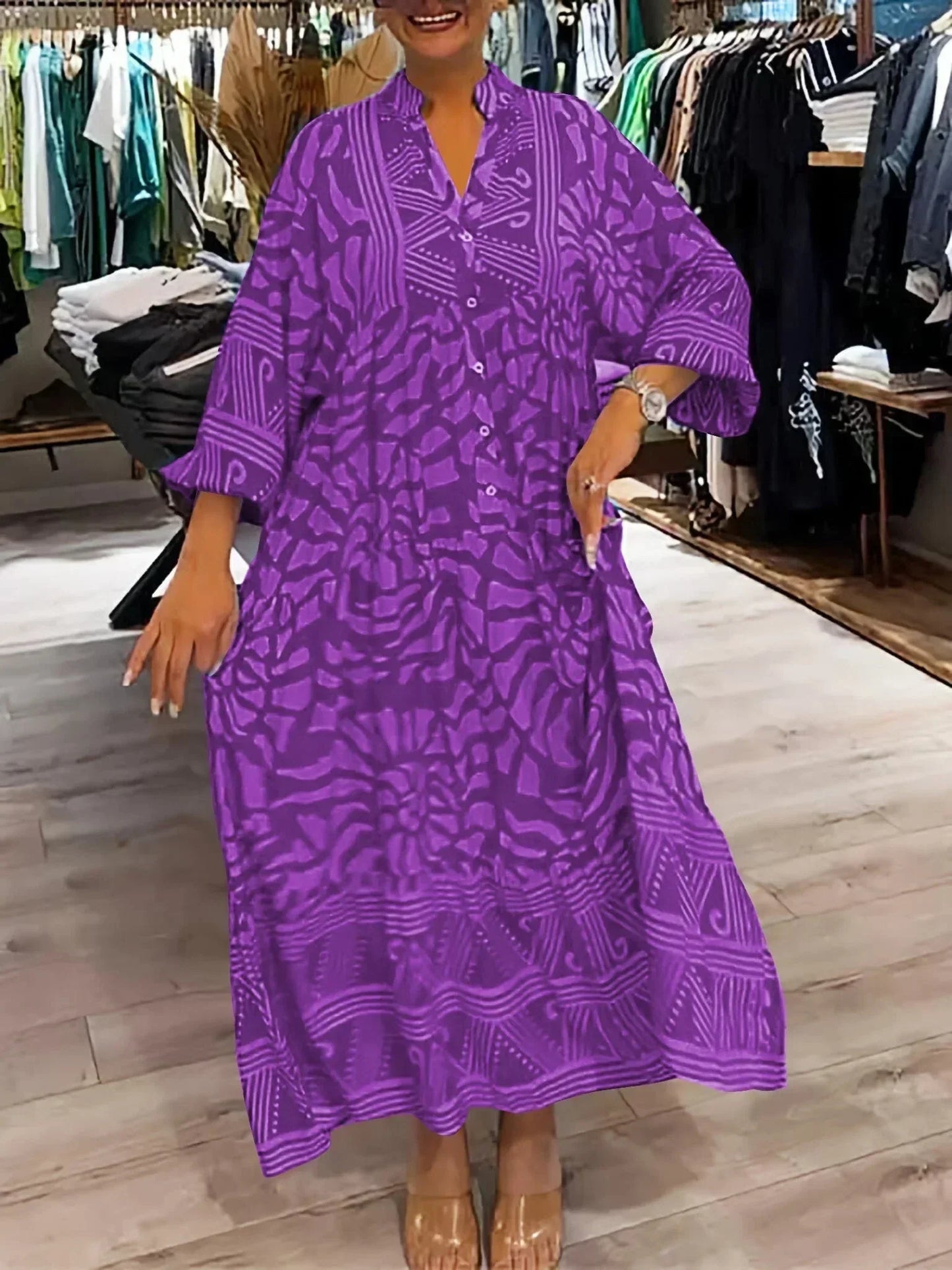 Robe longue fluide femme en violet, imprimée, avec manches longues et col en V, idéale pour les occasions décontractées.