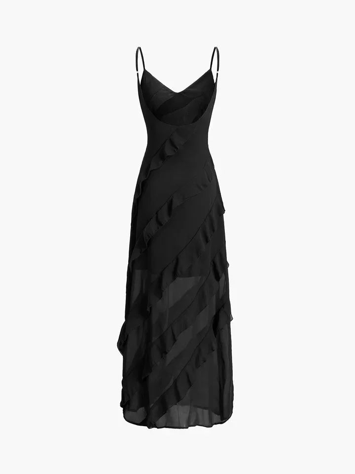 Robe longue asymétrique avec volants, en tissu léger, bretelles fines et détail fluide, idéale pour les soirées.