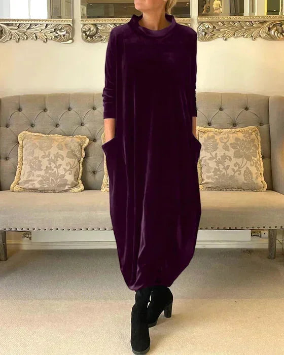 Robe midi ample pour femme en velours violet, dotée de poches latérales et d'une coupe décontractée et confortable.