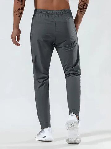 Pantaloni Sportivi Uomo in Tessuto Elasticizzato con Zip
