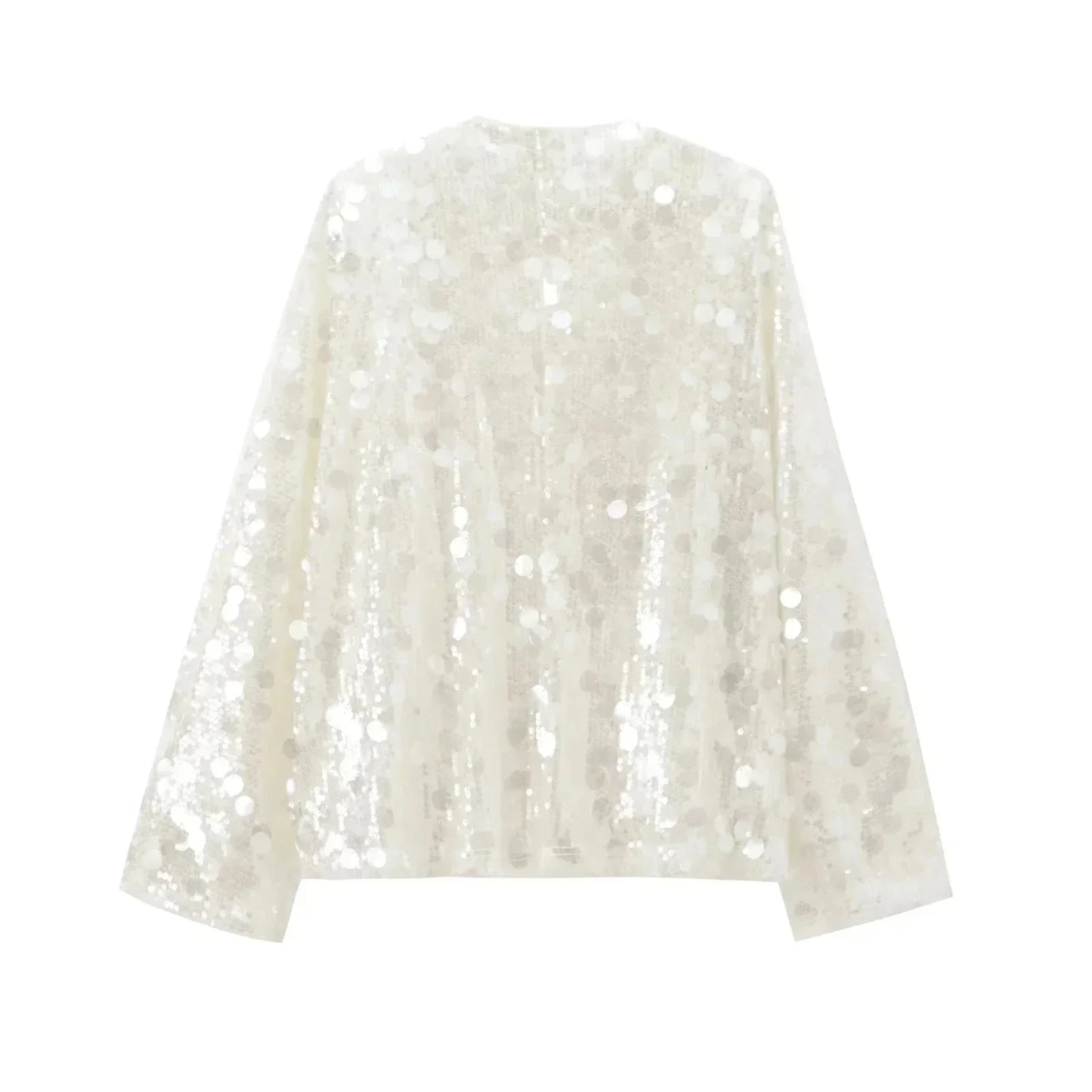 Blouse ivoire à paillettes avec col en V, en tissu léger, parfaite pour une tenue élégante et festive.