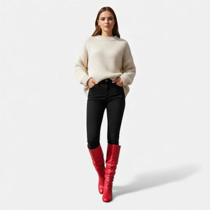 Bottes mi-hautes rouges en cuir avec nœud décoratif et talon bas pour un confort optimal.
