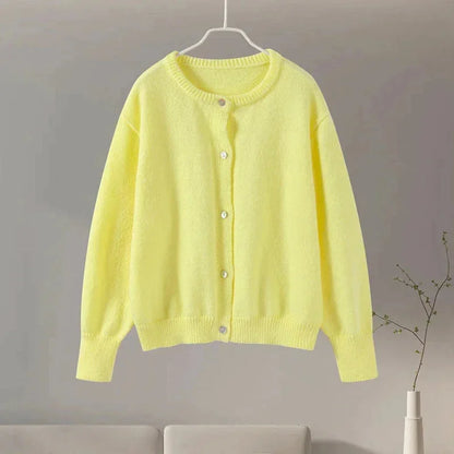 Cardigan femme à manches bouffantes, motif léopard, en tissu doux, idéal pour des tenues décontractées.