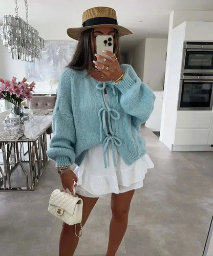 Cardigan femme kaki, design noué, manches amples, en tricot doux, coupe décontractée.