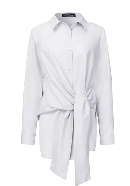 Chemise sans manches en mélange de coton, avec taille ajustable et ceinture nouée, coupe élégante, couleur blanche.
