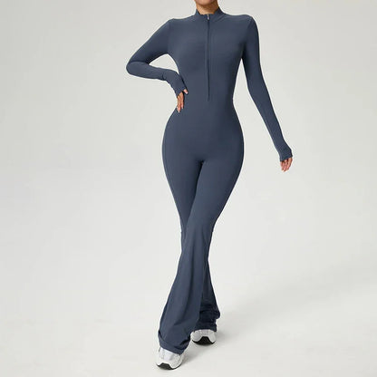 Combinaison de yoga bleue pour femme, manches longues, avec zip, en tissu respirant et élastique.