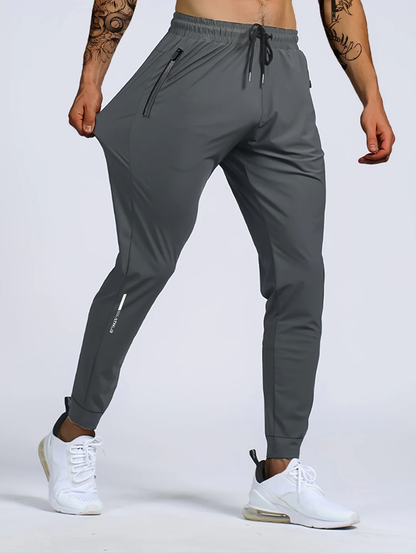 Pantaloni Sportivi Uomo in Tessuto Elasticizzato con Zip