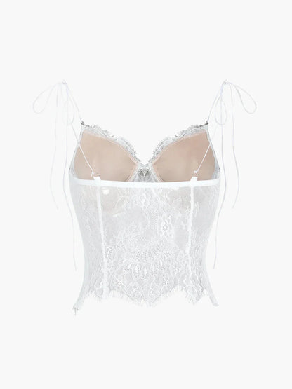 Débardeur femme en coton avec dentelle ajustable et fines bretelles, idéal pour un look élégant et décontracté.