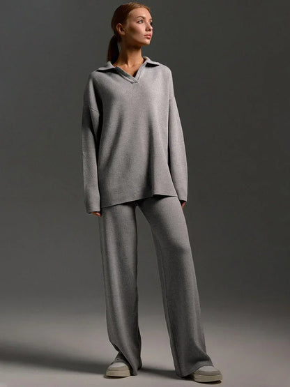 Ensemble femme noir avec col chemise et pantalon ample en mélange de coton léger.