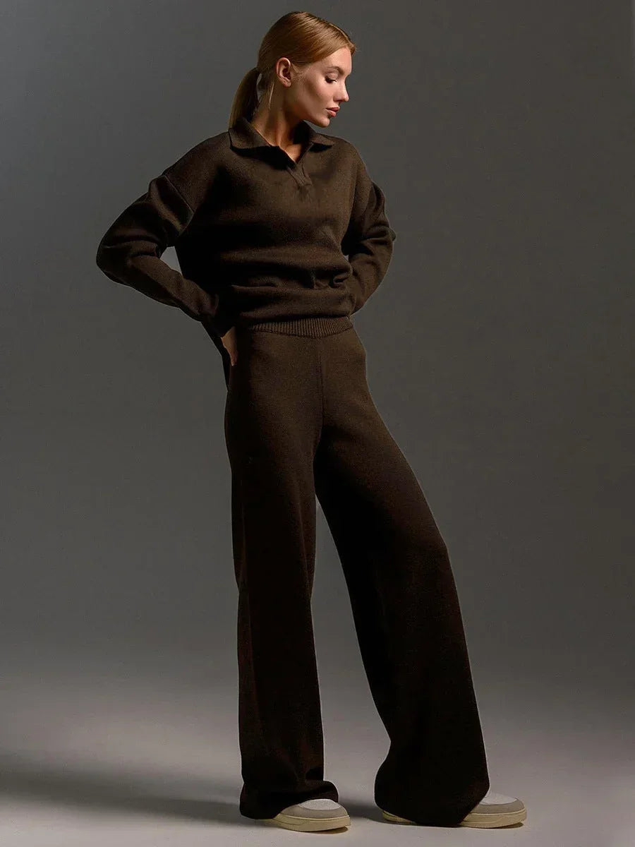 Ensemble femme noir avec col chemise et pantalon ample en mélange de coton respirant.