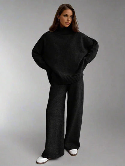 Ensemble femme rouge en maille douce, col roulé et coupe décontractée pour un confort optimal.