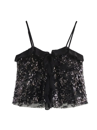 Haut femme noir à sequins, avec des détails en volants transparents et une coupe ajustée pour un look élégant.