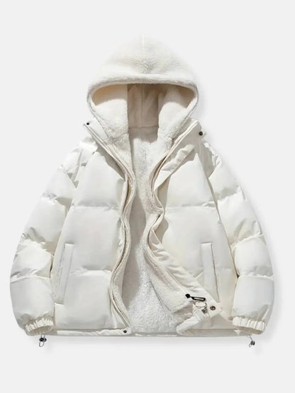 Doudoune d'hiver rose pour femme avec capuche et doublure douce, conçue pour le confort par temps froid.