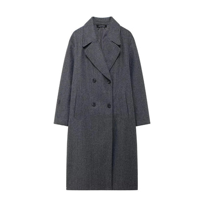 Manteau d'hiver femme beige, coupe oversize, en matériau chaud, avec poches pratiques.
