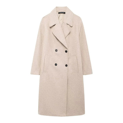 Manteau d'hiver femme beige, coupe oversize, en matériau chaud, avec poches pratiques et design intemporel.