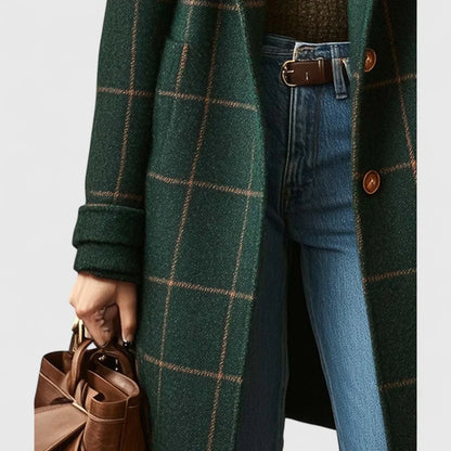 Manteau femme à carreaux verts foncés, en tissu résistant, avec boutons décoratifs et coupe classique.