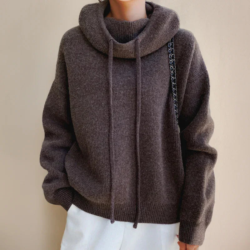 Pull col roulé femme en maille douce, avec capuche, couleur verte, parfait pour l'automne.
