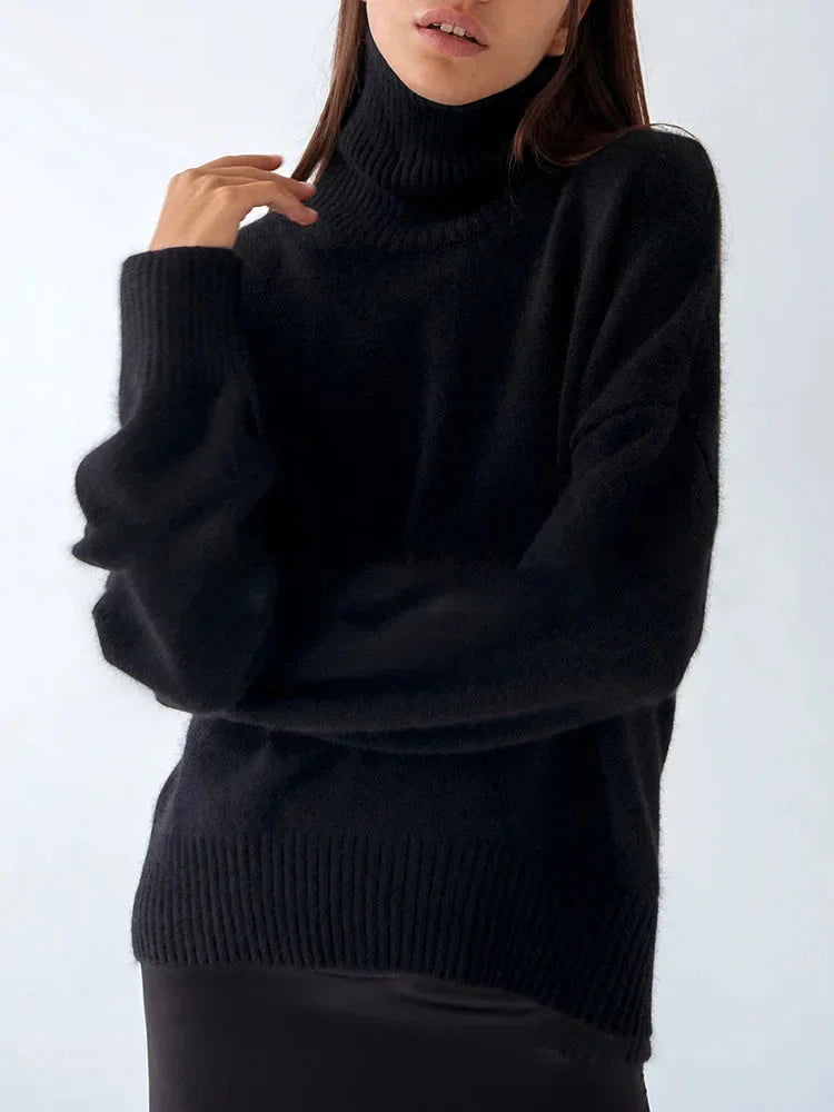 Pull col roulé orange pour femme, manches longues, en matière douce pour un confort quotidien.