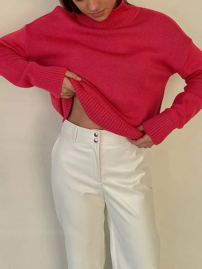 Pull col roulé femme kaki, manches longues, en matière douce, adapté pour les journées fraîches et décontractées.