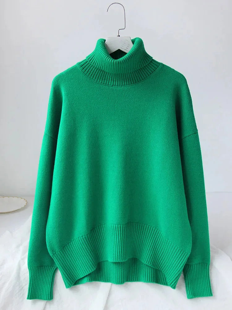 Pull col roulé femme orange, manches longues, en matière douce et respirante, adapté pour les journées fraîches.