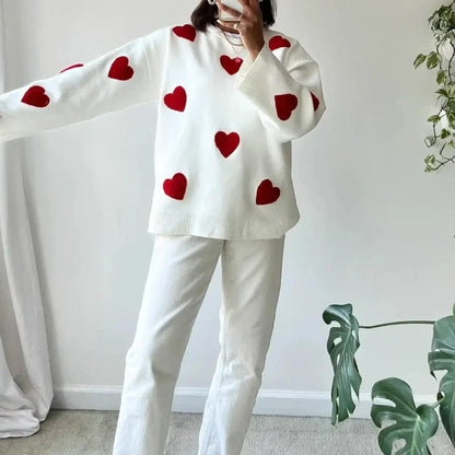 Pull décontracté femme blanc avec motif cœur rouge, en coton doux, adapté pour les occasions décontractées.