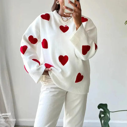 Pull décontracté femme blanc avec motif cœur rouge, en coton doux, adapté pour un style quotidien.