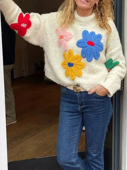 Pull femme blanc avec fleurs brodées colorées en coton, coupe décontractée.