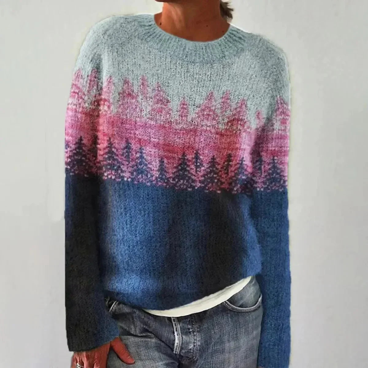 Pull femme vert rayé en tricot, col bateau large et coupe décontractée.