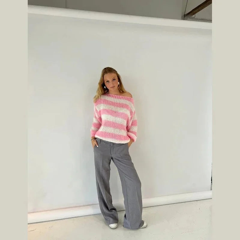 Pull femme décontracté à rayures vert, en maille douce, coupe confortable pour un style décontracté.