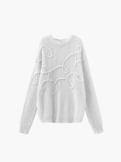 Pull femme à motif texturé moderne en coton, coupe décontractée, adapté pour le quotidien.
