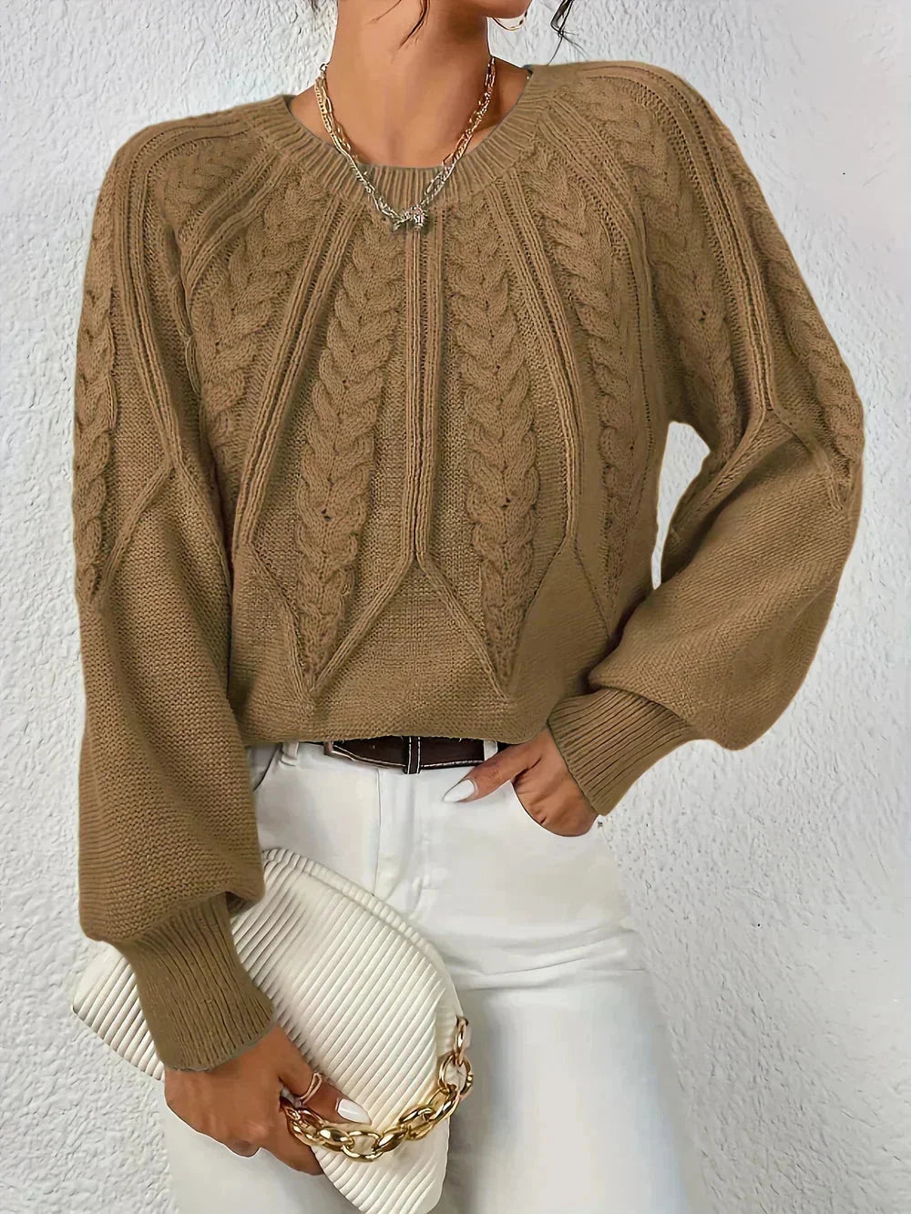 Pull femme rouge à motif torsadé, manches longues, en coton doux et respirant.