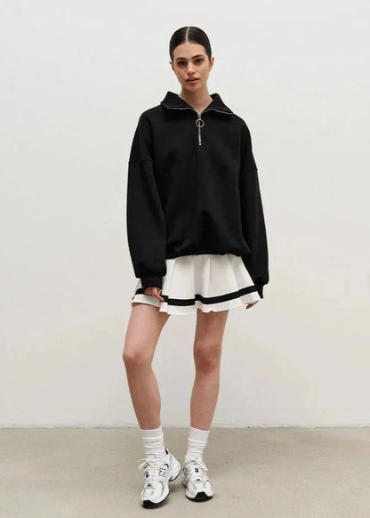 Pull à fermeture éclair bleu marine, coupe décontractée, en mélange de coton, adapté pour des occasions décontractées.