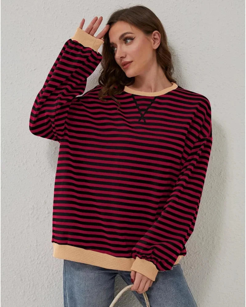 Pull rayé oversize femme en mélange de coton, couleur bleue, pour un style décontracté et confortable.