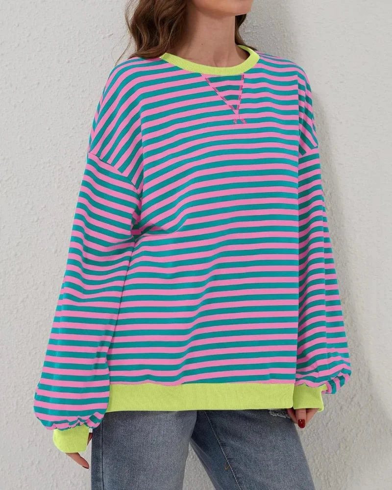 Pull rayé oversize femme en mélange de coton, couleur rose, conçu pour un style décontracté au quotidien.
