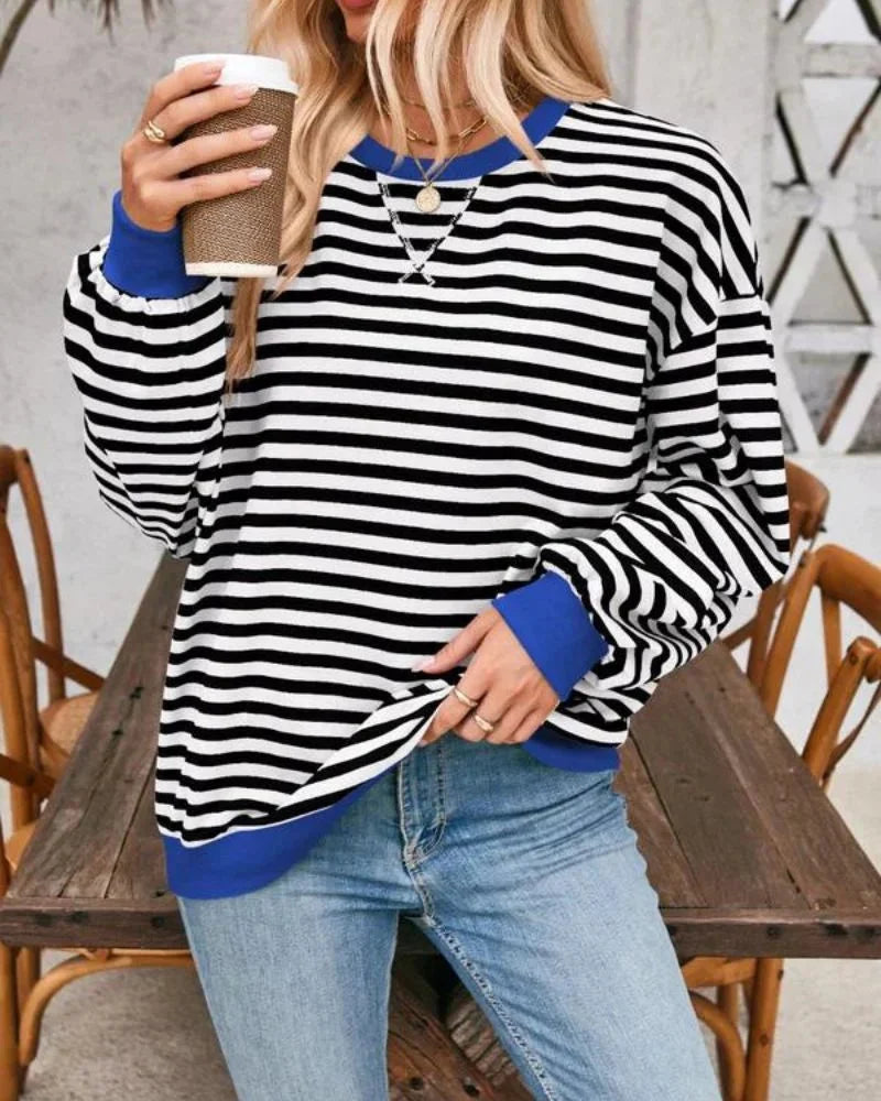 Pull rayé oversize femme en mélange de coton, couleur vin, pour un style décontracté.