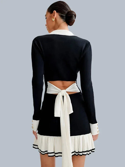 Robe courte femme en coton, ornée de volants élégants et de boutons distinctifs sur le devant. Idéale pour les occasions…