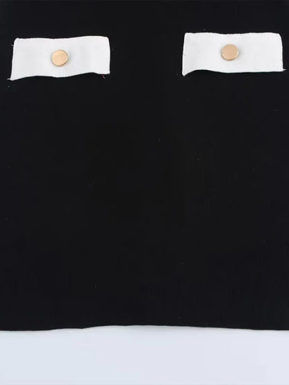 Robe courte noire pour femme en polyester, avec boutons découpés et silhouette cintrée pour un look élégant et décontracté.