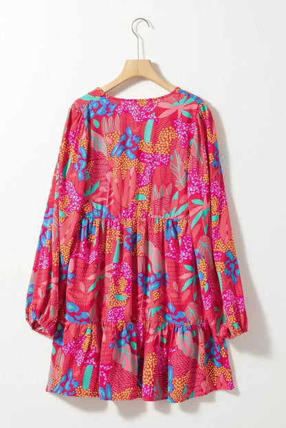 Robe courte en coton léger, imprimée avec des manches évasées, idéale pour un look décontracté estival.