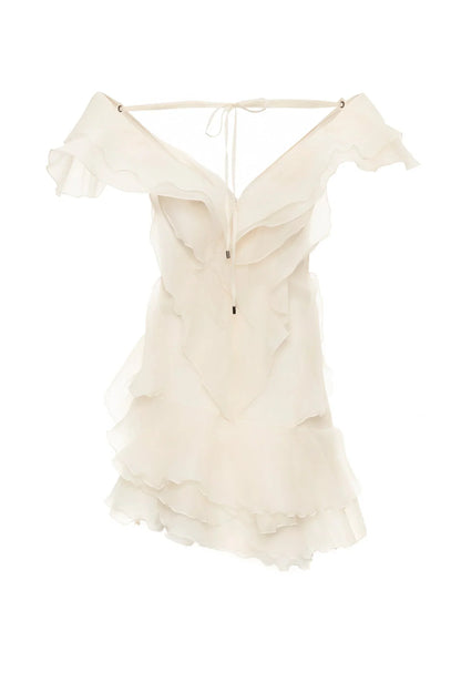 Robe d'été femme blanche avec volants, en coton léger, idéale pour les journées ensoleillées et décontractées.