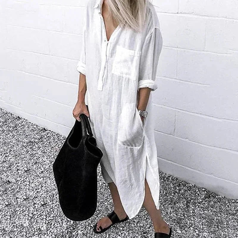 Robe longue ample en lin blanc pour femme, avec poches pratiques et design confortable pour un style décontracté.