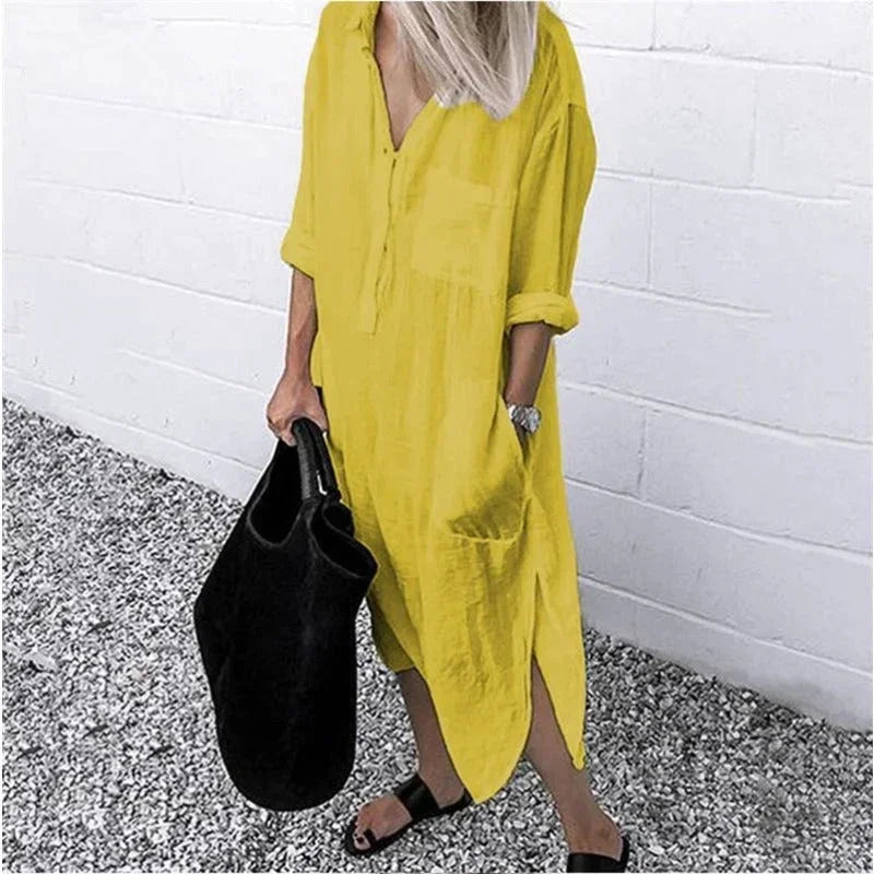Robe longue ample en lin jaune pour femme, dotée de poches pratiques et d'une coupe décontractée. Parfaite pour l'été.