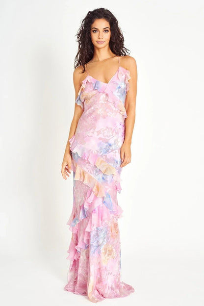 Robe longue femme à volants, en coton léger, avec des motifs floraux et une coupe fluide pour un confort optimal.