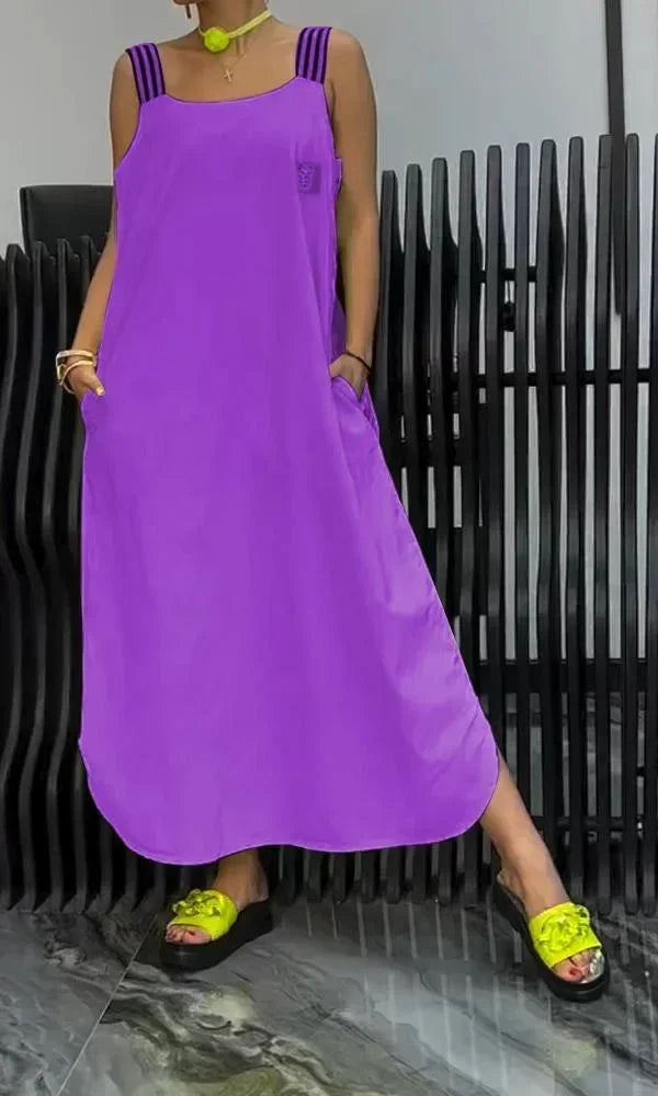 Robe longue violet femme, en coton léger, avec bretelles larges et poches pratiques pour un style décontracté.