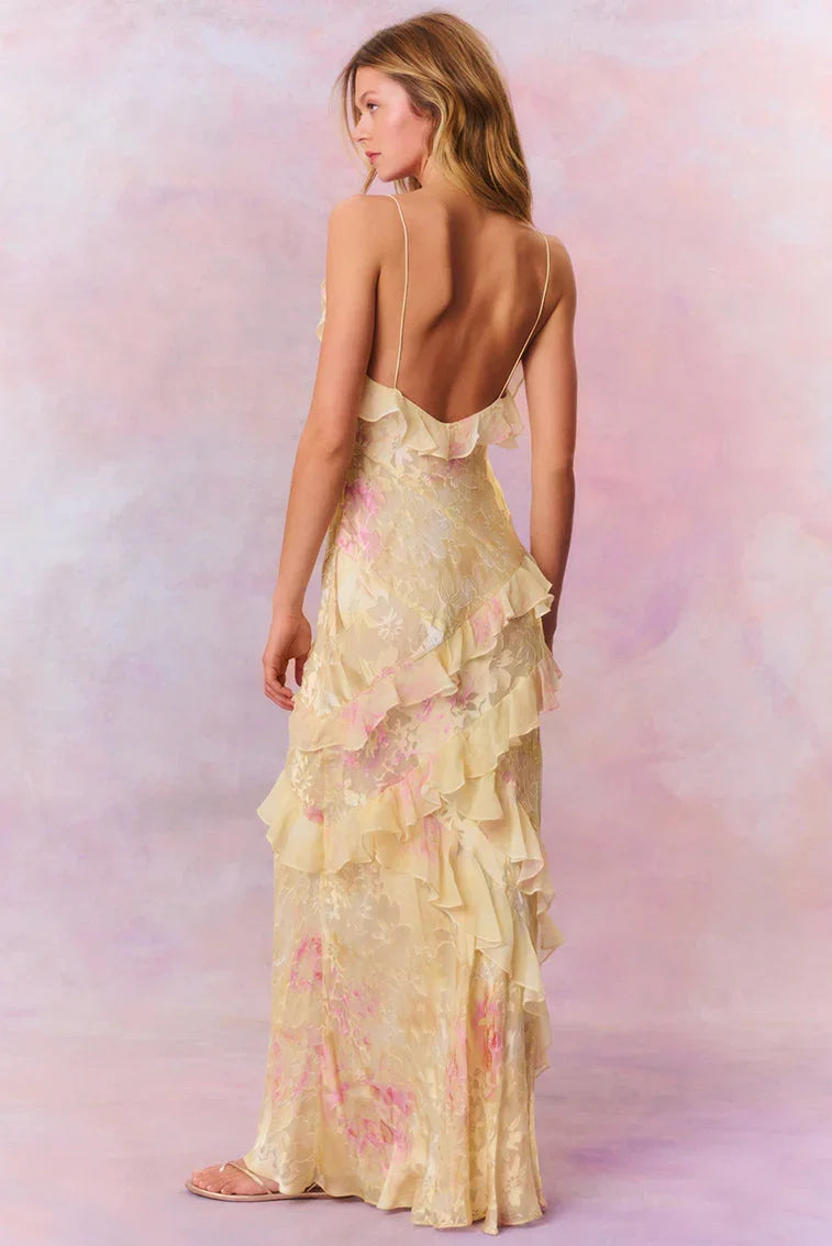 Robe longue femme en tissu léger, volants asymétriques, bretelles fines, idéale pour les occasions décontractées.
