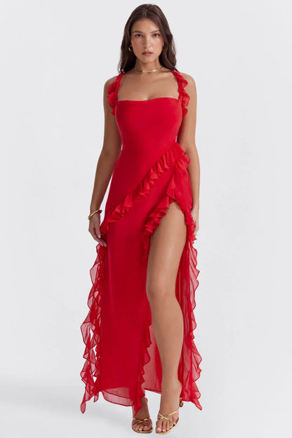 Robe longue femme en coton, volants fluides et bretelles fines, parfaite pour une allure délicate et estivale.