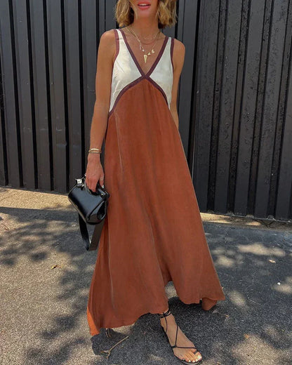 Robe longue femme bicolore sans manches, col en V, en tissu léger et fluide, parfaite pour les journées estivales.