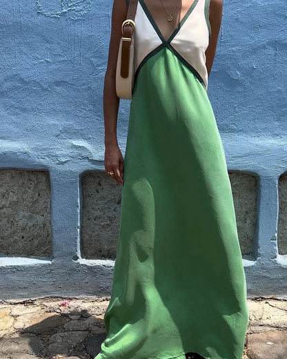 Robe longue femme bicolore, col en V, sans manches, en tissu léger, idéale pour les journées ensoleillées.