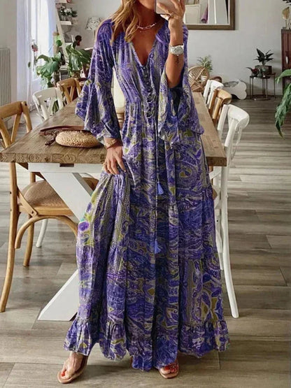 Robe longue bohème violet pour femme, manches évasées, imprimée estivale en tissu léger et fluide. Parfaite pour les…