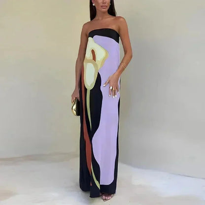 Robe longue en tissu léger lavande, bustier avec motifs abstraits fluides, idéale pour les occasions estivales.